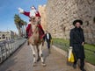 Copiii din Ierusalim întreabă: Moș Crăciun, vei veni în ciuda războiului?